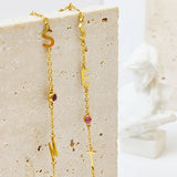 Golden Astoria – Collier initiales personnalisées avec pierres précieuses